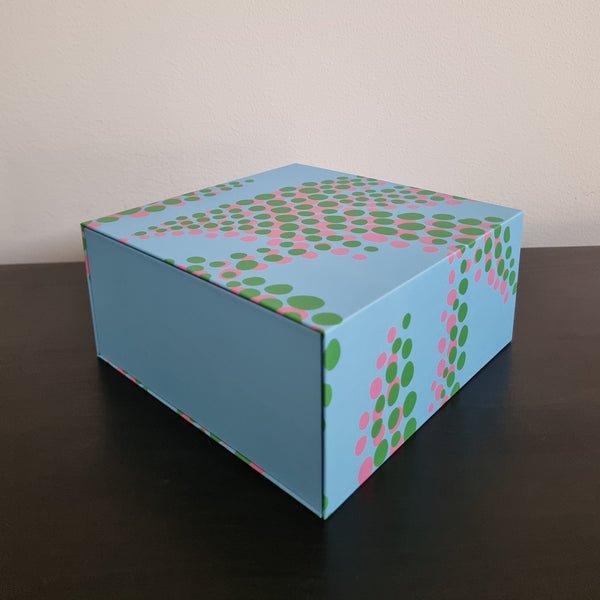 Gaveæske med grønne og lyserøde prikker