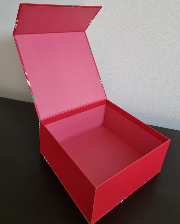 Red gift box with multicolored pattern