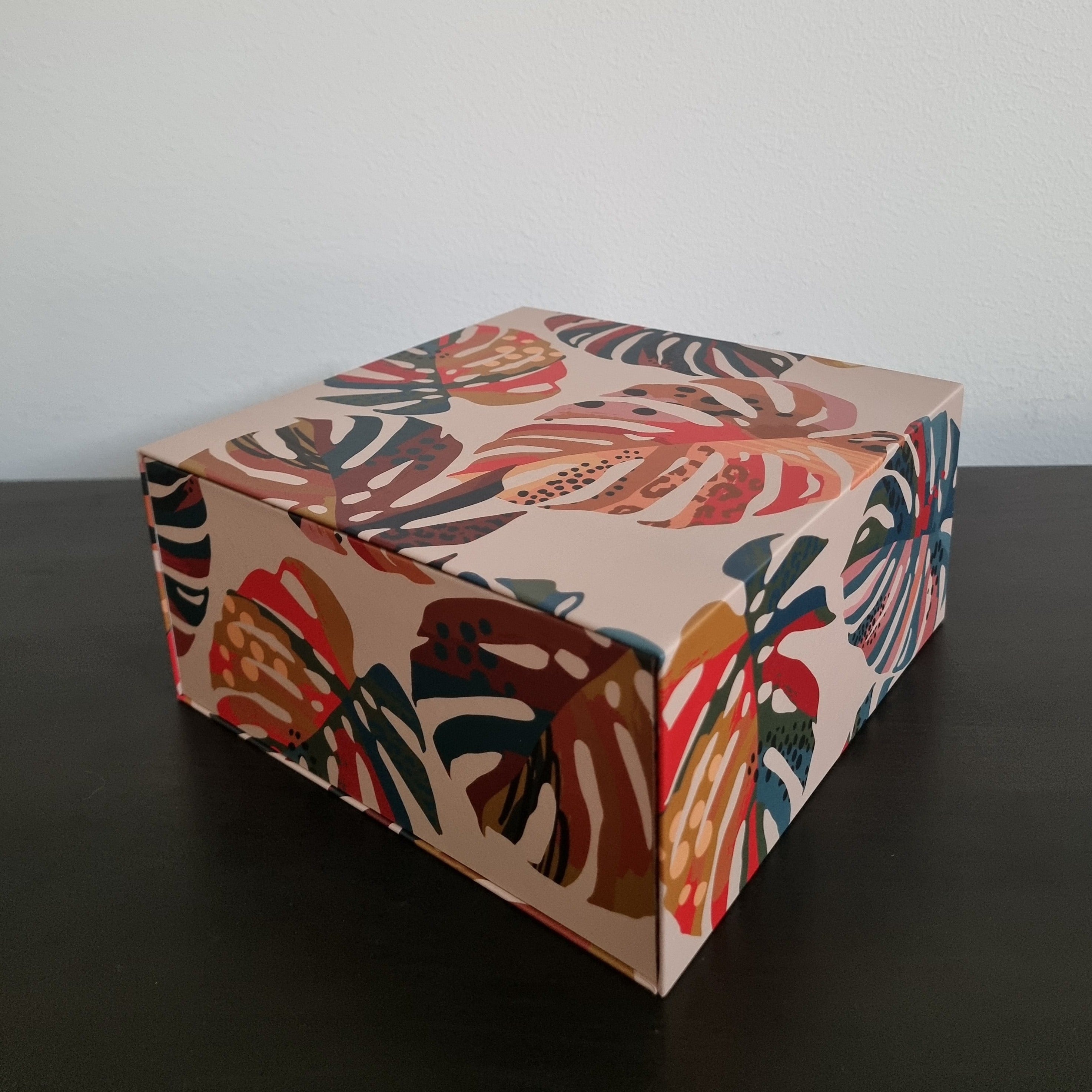 Gift box with colored leaves