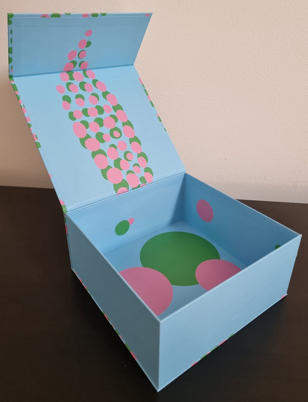 Gift box with green and pink dots
