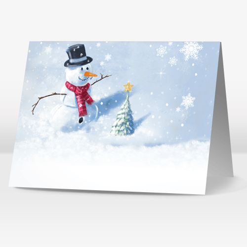 Happy snowman and small Christmas tree